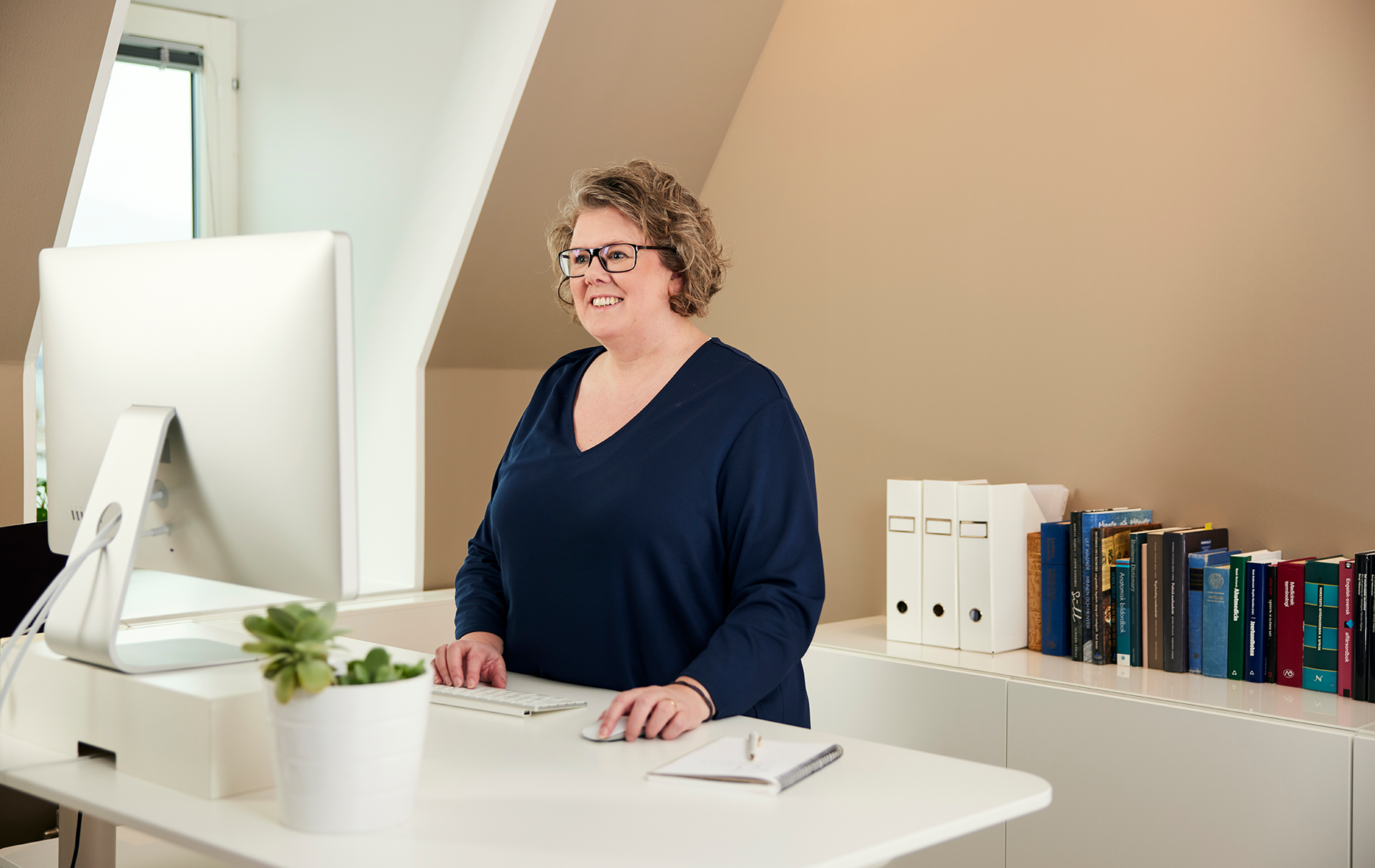 Woman speaking to doctor